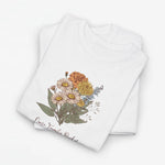 Wit T-shirt met bloemenboeketprint en sierlijke tekst onderaan