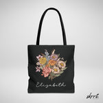 Zwarte tote bag met bloemenboeketprint en naam Elizabeth, brede hengsels.
