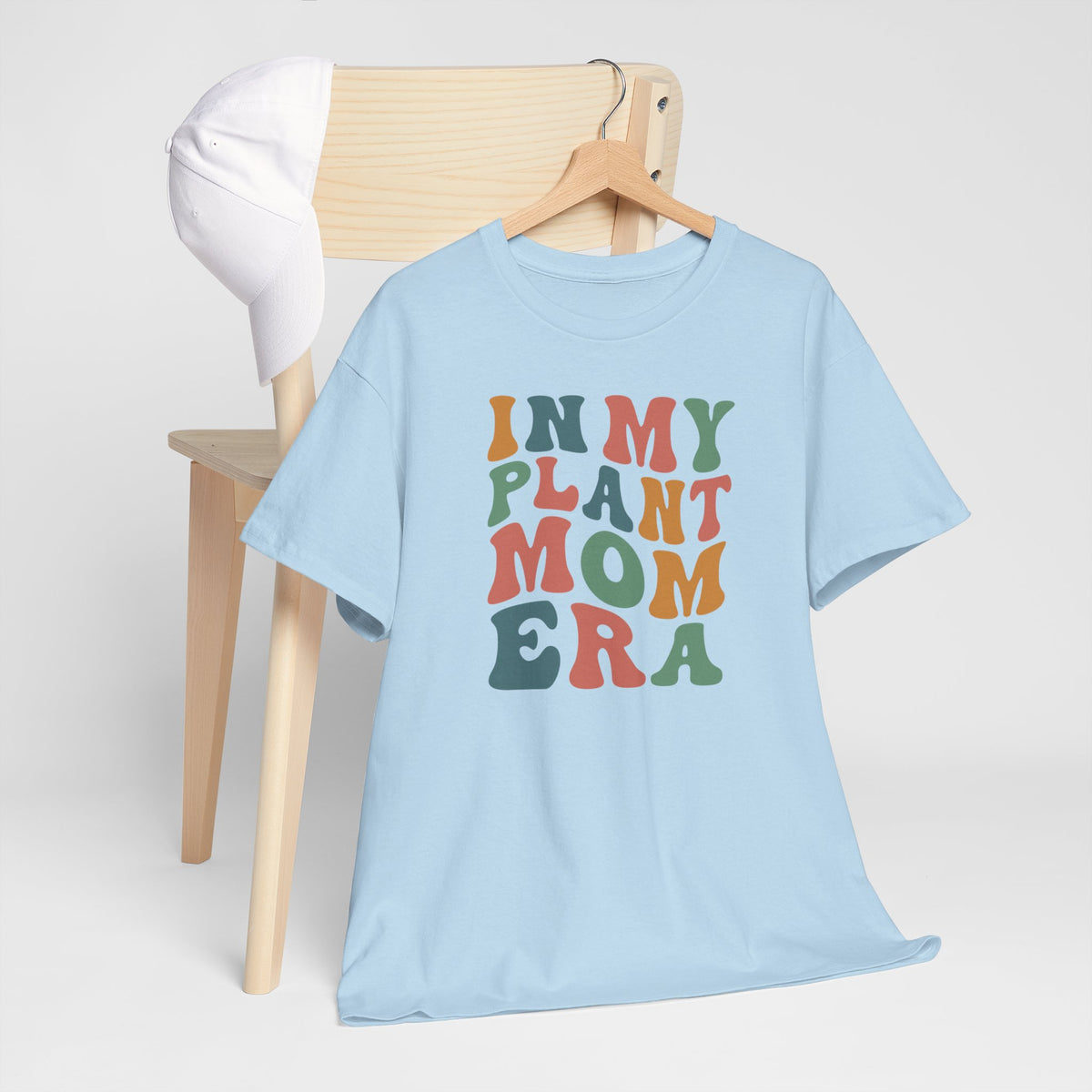 Lichtblauwe oversized T-shirt met ronde hals en gekleurde tekstprint op de borst