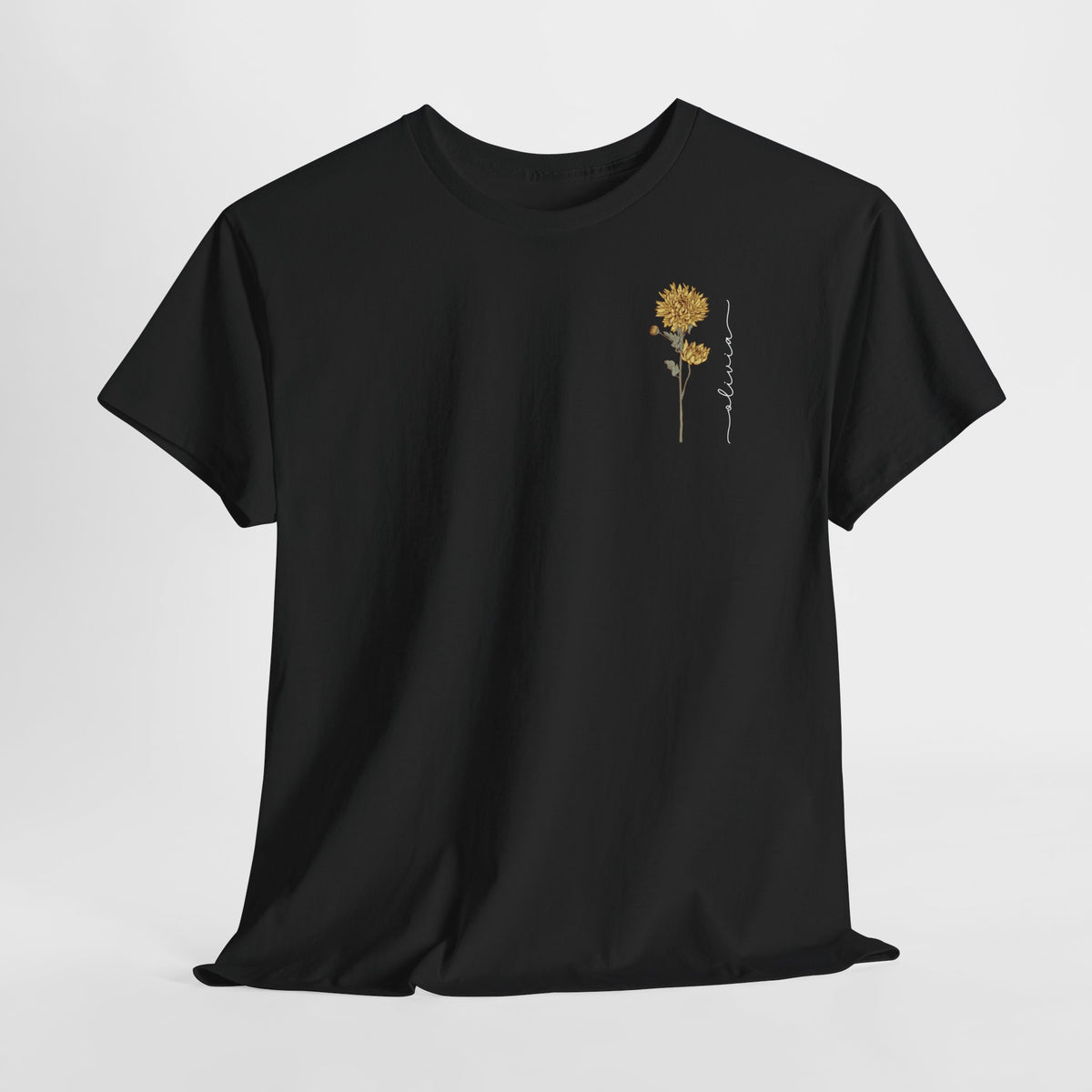 Zwart T-shirt met kleine gele bloemprint op de borst