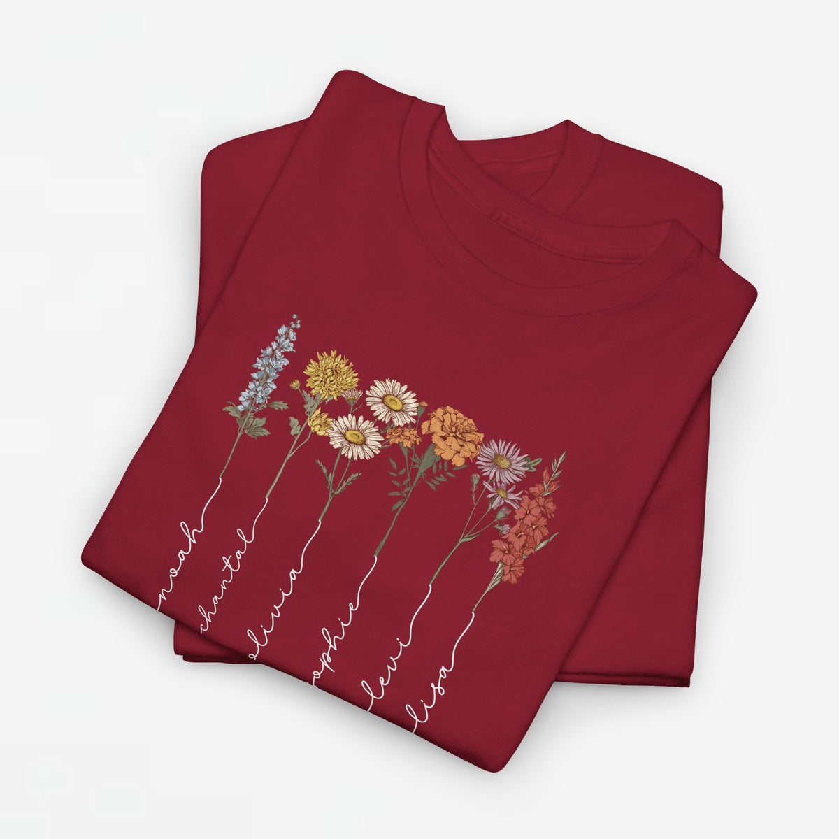 Rood t-shirt met bloemenprint en witte sierlijke namen, front met opgestapelde shirts