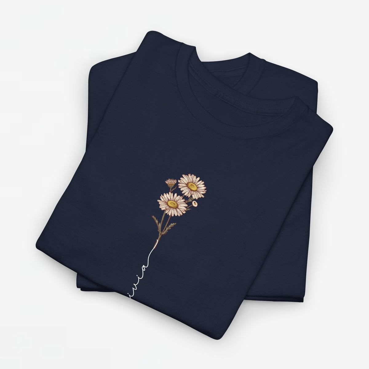 T-shirt navy met madeliefjesprint en sierlijke lijn op de borst