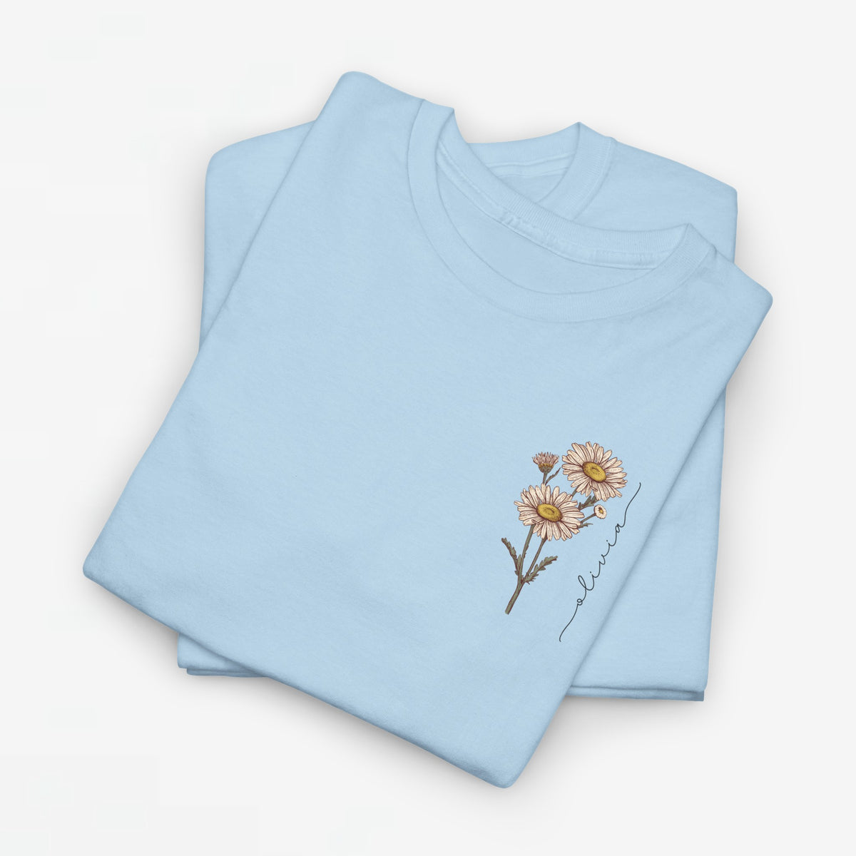 T-shirt lichtblauw met kleine bloemenprint op de borst