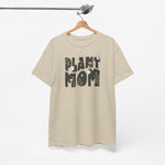 Oversized zandkleurig t-shirt met 'Plant Mom' plantenprint en ronde hals.