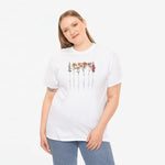 Wit T-shirt met geboortemaand bloemenprint in verschillende kleuren op de borst