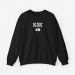 Sweater met ronde hals in zwart en borstprint “KOK”