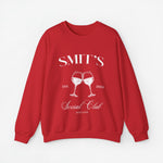 Rode sweater met opdruk “SMIT’S Social Club Zeeland 2024” en wijnglazen.