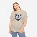Oversized T-shirt zandkleurig met zwarte berenprint, gedragen met jeans