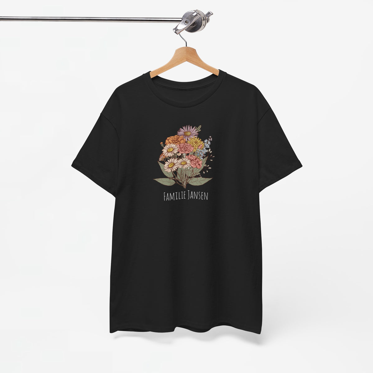 Zwarte T-shirt met bloemenboeketprint en 'Familie Jansen' op de borst