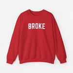 Sweatshirt met lange mouwen in rood met tekst BROKE op de borst.