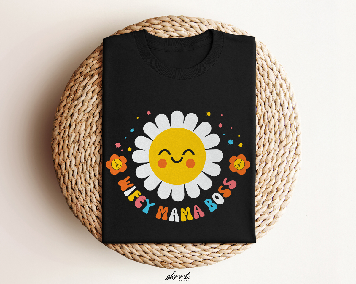 Zwart T-shirt met zonnetje-bloem en kleurrijke tekstprint.