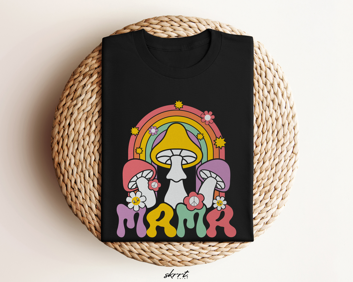Zwarte oversized t-shirt met regenboog-paddenstoelprint en bloemaccenten