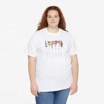 Wit T-shirt met bloemenstelen in pasteltinten en bloemenprint op de borst