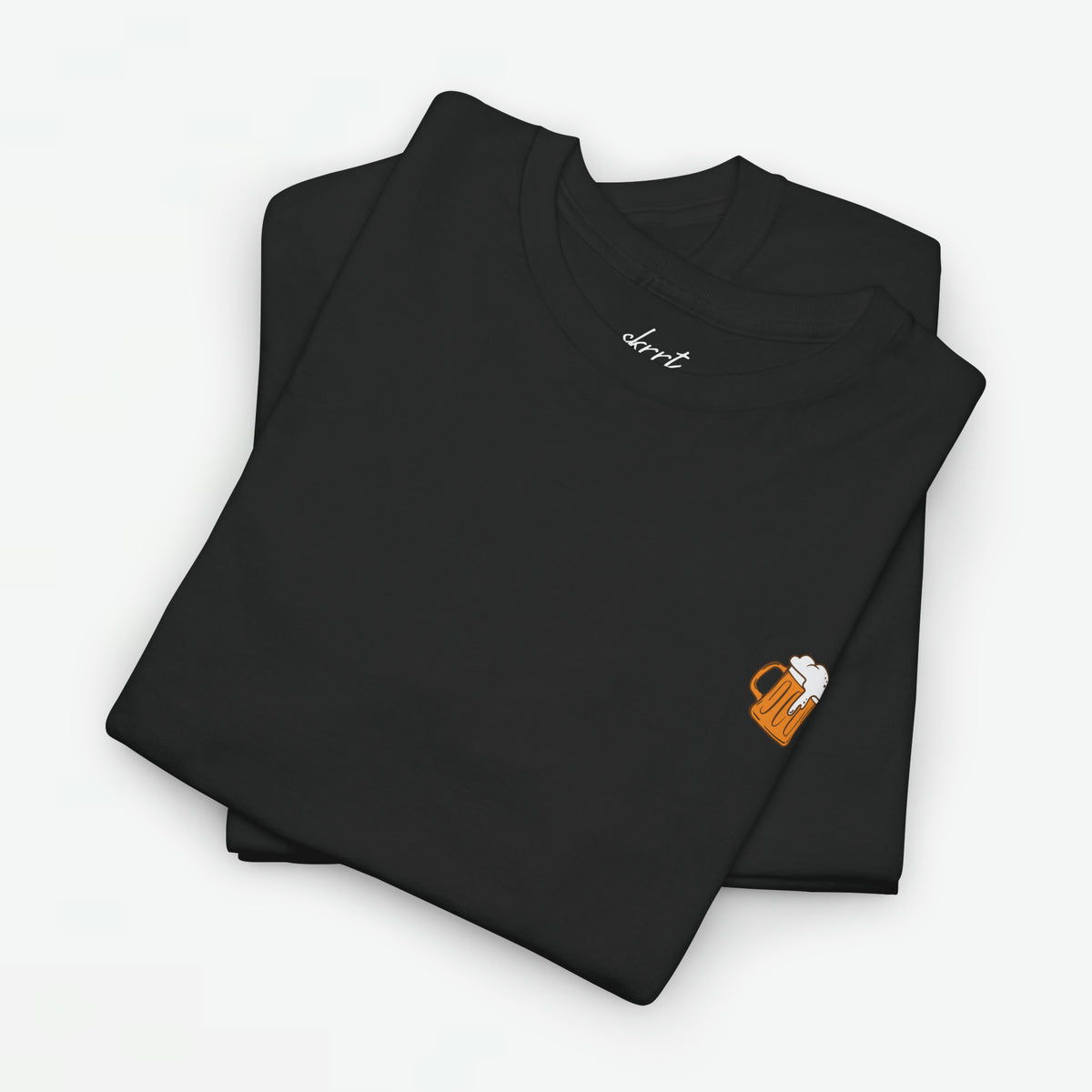 Zwarte dames T-shirts (2 stuks) met kleine borstprint, plat op elkaar