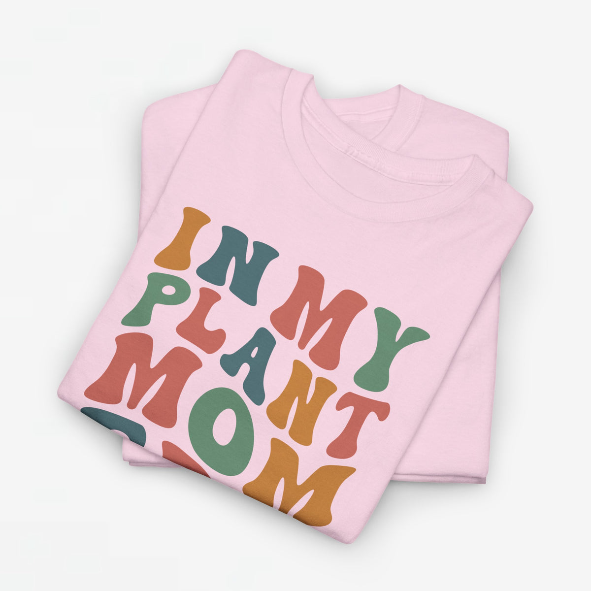 Lichtroze oversized t-shirt met kleurrijke 'IN MY PLANT MOM ERA' print op de borst