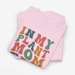 Lichtroze oversized t-shirt met kleurrijke 'IN MY PLANT MOM ERA' print op de borst