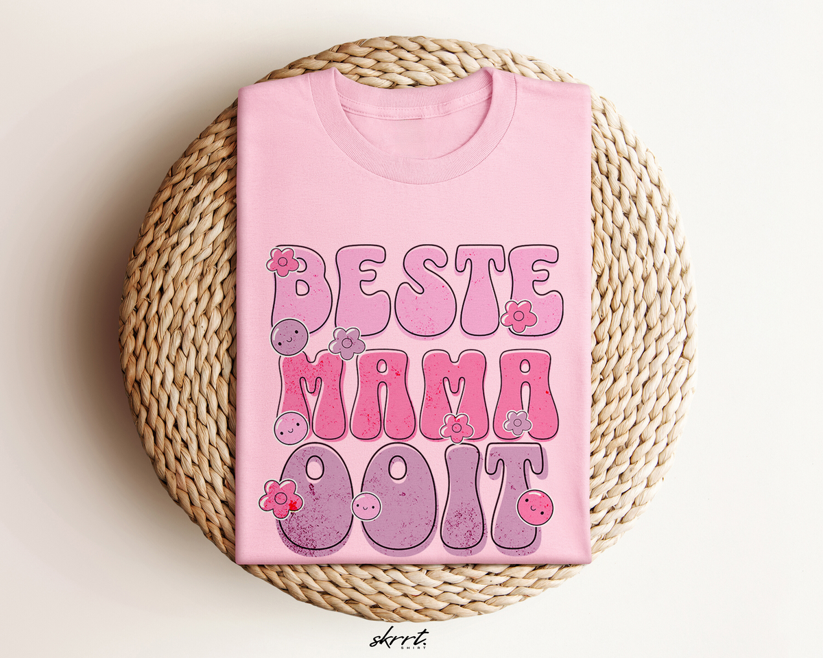 Roze oversized T-shirt met grote tekstprint en bloemen op de borst