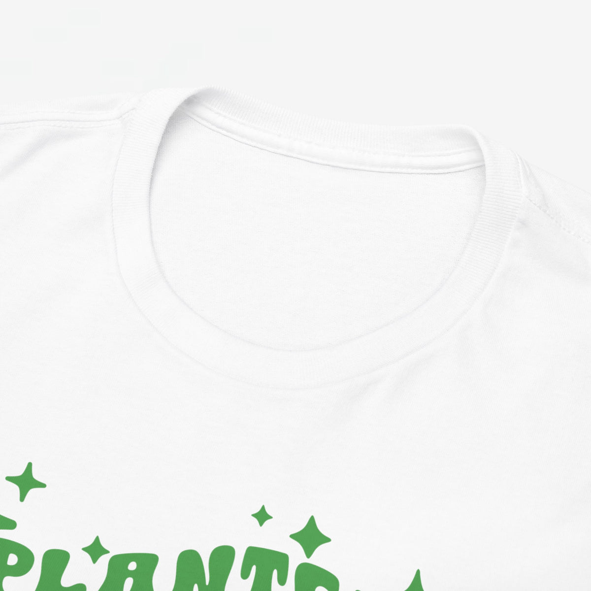 Wit T-shirt met ronde hals en groen printmotief op de borst