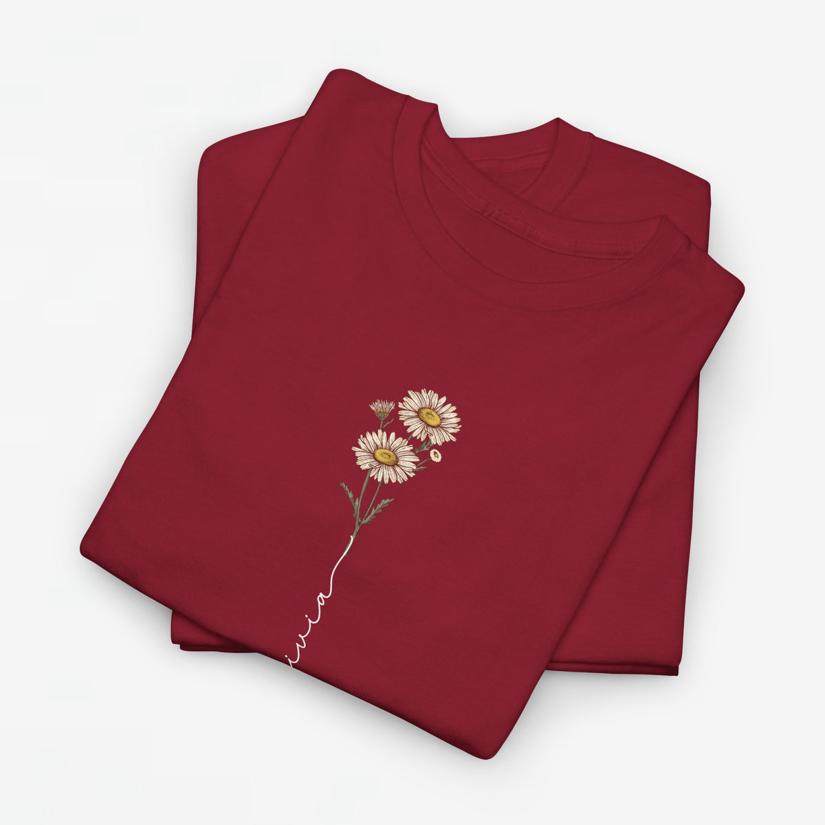 T-shirt bordeaux met madeliefjesprint en sierlijke lijn op de borst