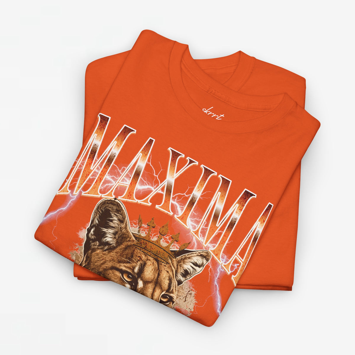 Oranje T-shirt met voorprint: MAXIMA-letters en leeuwenkop onder spettereffect.