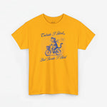 Oranje oversized t-shirt met blauwe opdruk van kat op fiets en tekst voorop