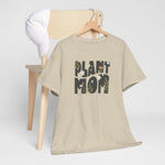 Oversized zandkleurig t-shirt met 'Plant Mom' plantenprint vooraan, korte mouwen.