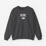 Sweater met ronde hals in donkergrijs/zwart en borstprint “KOK”