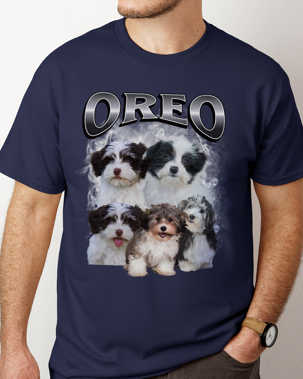Donkerblauw t-shirt met 'OREO' tekst en collage van kleine honden.