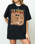 Zwart t-shirt met grote kattenfoto-print in oranje en goudtinten.