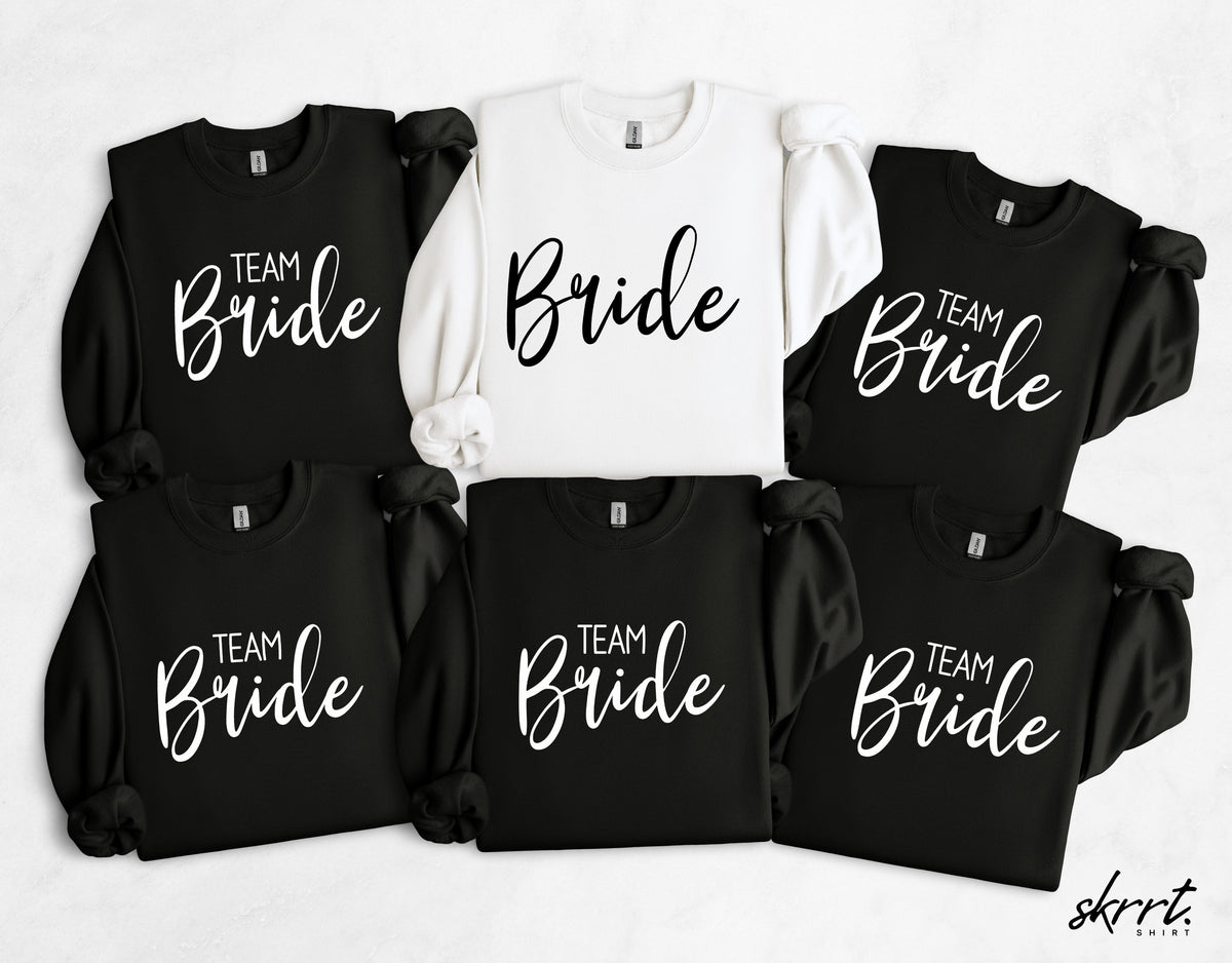Set van sweatshirts zwart en wit met 'Team Bride'-opdruk en strikmouwen